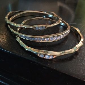 three gold bangles (one set)