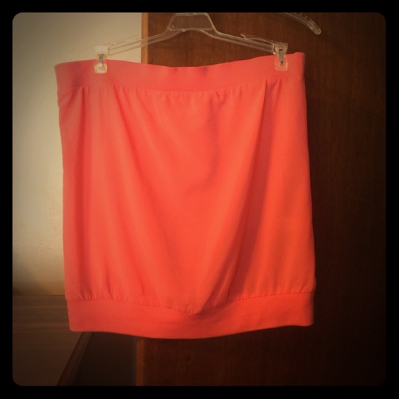 Strapless coral top.