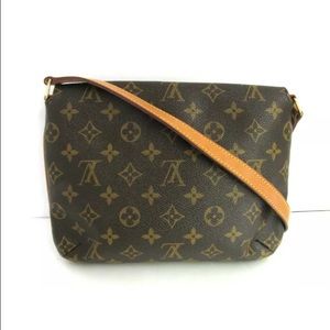 LV authentic tango musette with dustbag.