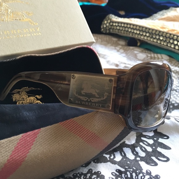 Burberry Sunglasses, mint condition. Never worn.