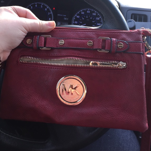 Burgundy mk satchel never. Bought from outlet