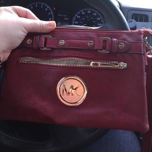 Burgundy mk satchel never. Bought from outlet