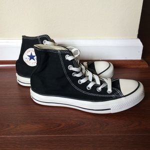 Black and white high top converse