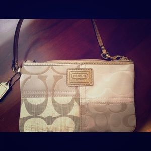 Gold coach wristlet