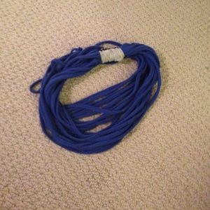 A hand made blue and gray scarf.