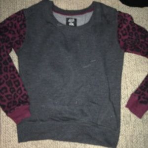 Fox sweater with leopard sleeves!
