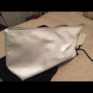 White sparkly make up bag