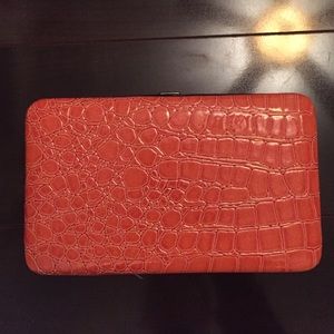 MSC orange clutch wallet, never used