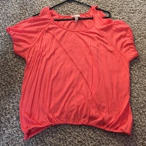 Open shoulder loose fitting coral orange shirt