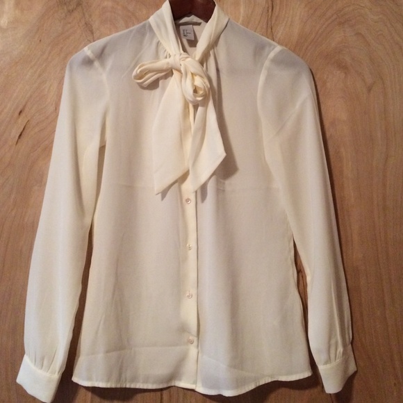 Cream blouse with tie-front detail