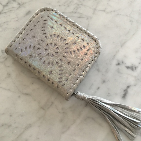 Cleobella Silver iridescent wallet.