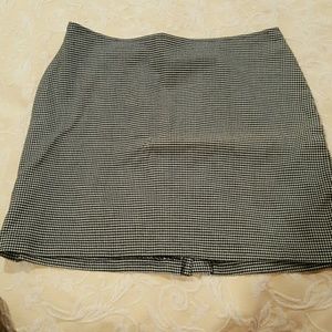Donated Black & white plaid mini skirt.  Sz 13