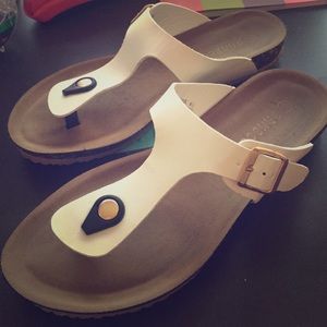 White birkenstock style sandals
