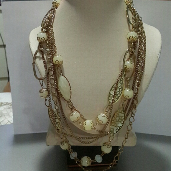 Multi Strand gold toned necklace