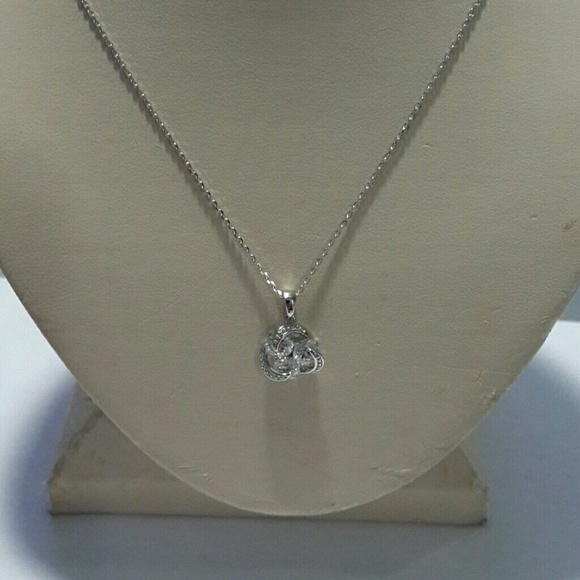 3 stone diamond like swirl necklace