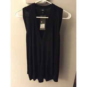 Never worn! Good for work or dressing down.