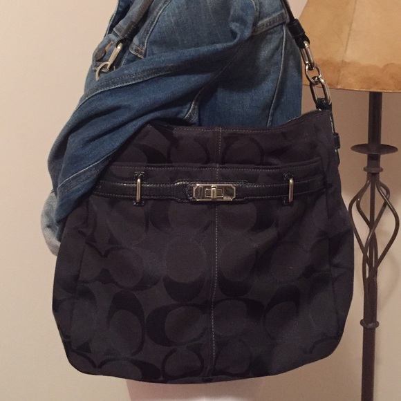 Authentic Coach shoulder bag with silver hardware.