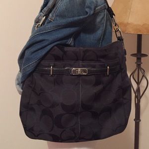 Authentic Coach shoulder bag with silver hardware.