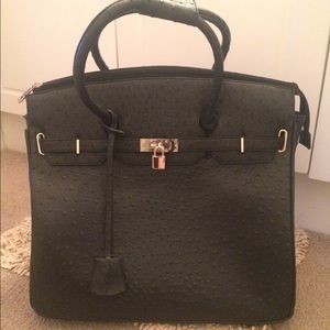 KC Jagger faux ostrich rolling bag