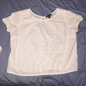 Shirt with little cutouts