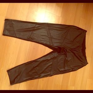 Black torrid faux leather pants with cotton back