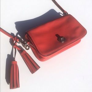 Coral Coach Purse With Tassel