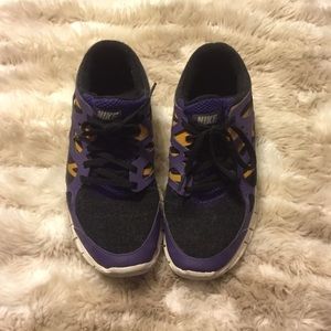 Purple and rustic yellow Nikes!