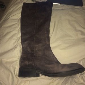 Distressed brown leather boots