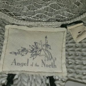 Unique and comfy sweater coat. Worn once!