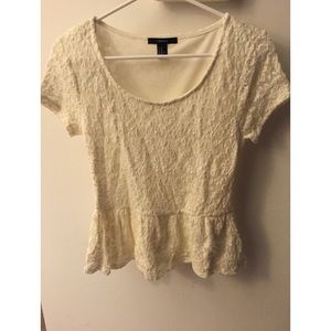 Beautiful white peplum top. Only worn once.