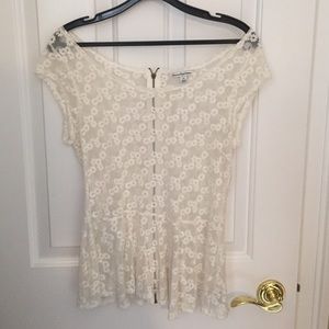 Sheer and stitched peplum top