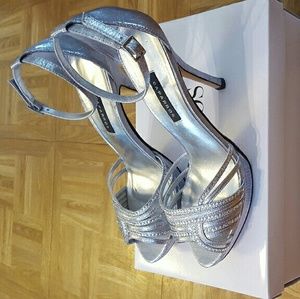 Silver Caparros heels