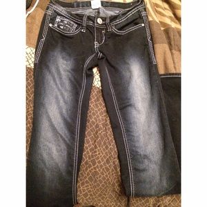 dark-wash distressed bootcut jeans