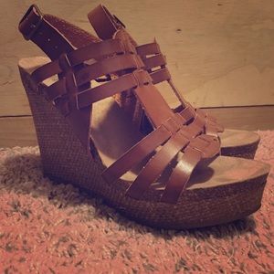 Mia brown leather platform with a woven wedge.