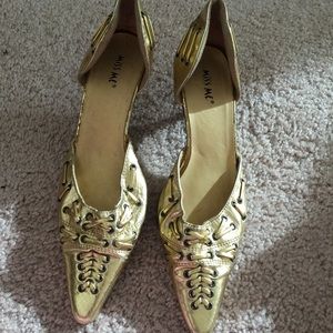 Gold color pumps