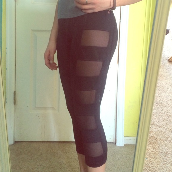 Never worn, netted sides, black cropped leggings
