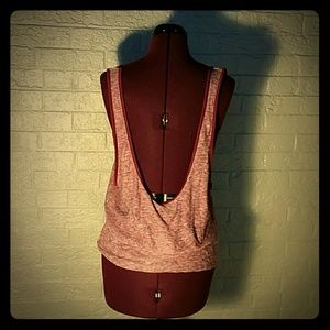 Drop-back, loose pink tank top