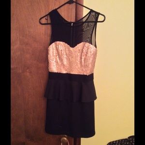 Black and gold peplum dress