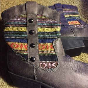 Cute boots with fabric design insets.