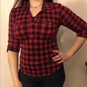 Red plaid 3/4 sleeve shirt.