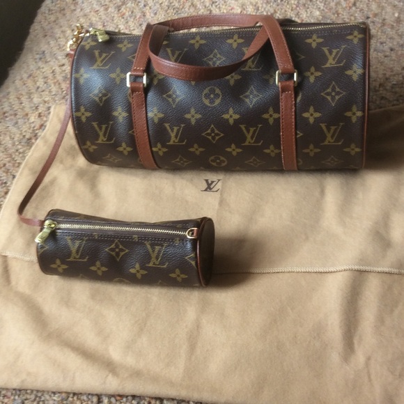 Authentic Louis Vuitton  hand bag with mini bag.
