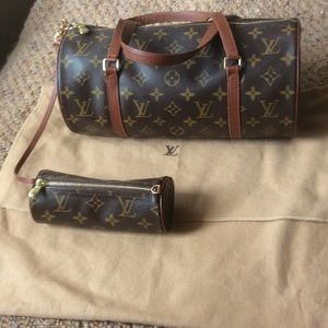 Authentic Louis Vuitton  hand bag with mini bag.