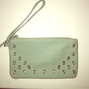 Teal wristlet with skull beading