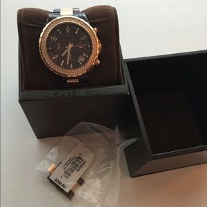 Tortoise and Rose Gold Michael Kors watch.