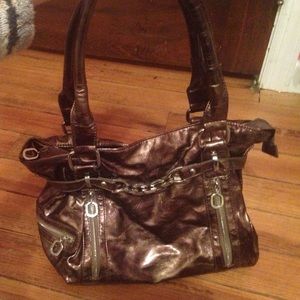 Brown over the should purse