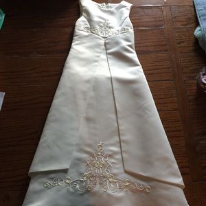 Miniature bridal grown for a flower girl.