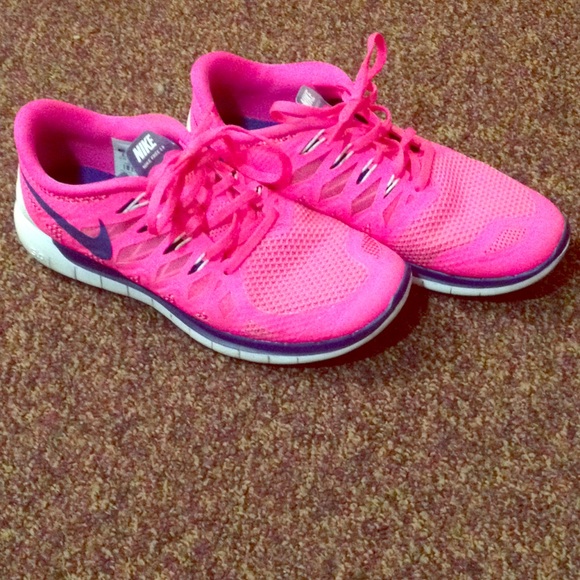 Hot pink Nike Free 5.0 shoes