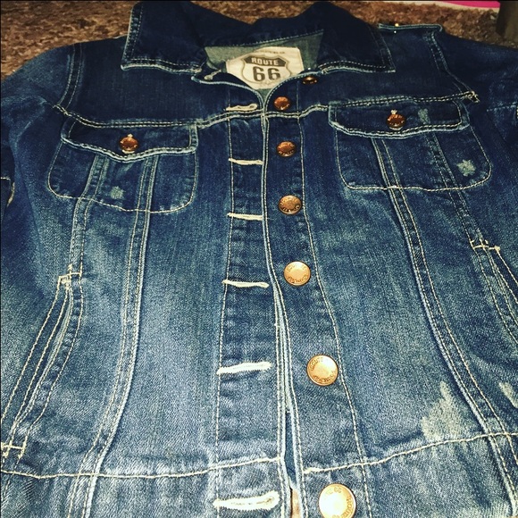 Distressed jean jacket