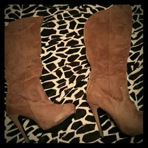 Brand new High heel boots .