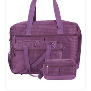 New in Pkg three piece purple travel set
